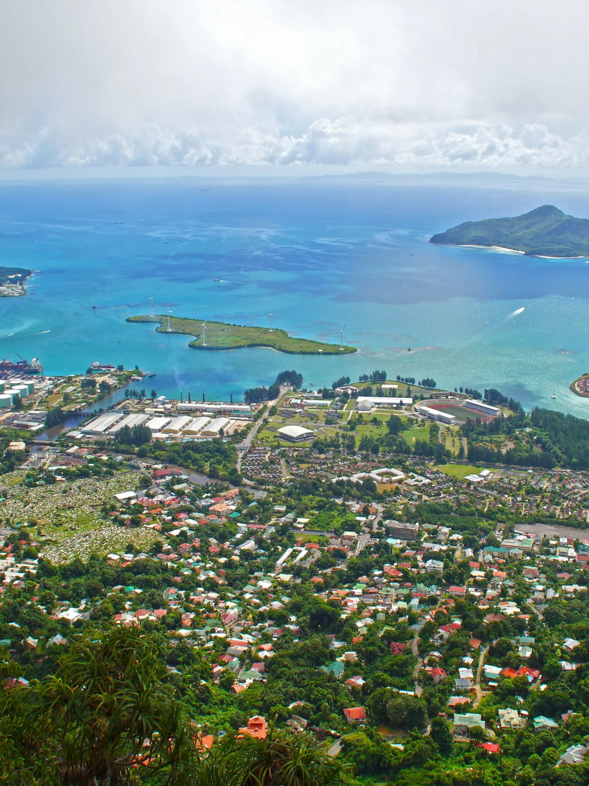 Victoria and its harbour seen from the hills above, with Sainte Anne and the reef beyond